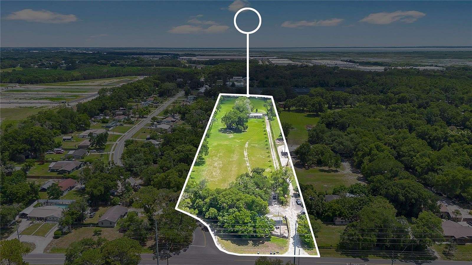 6.4 Acres of Land with Home for Sale in Apopka, Florida