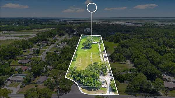 6.4 Acres of Land with Home for Sale in Apopka, Florida