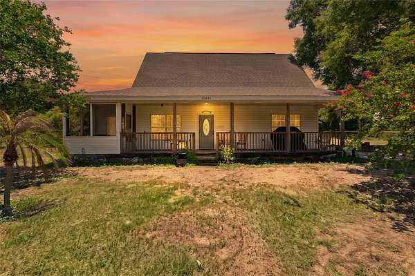 9.8 Acres of Land with Home for Sale in East Lake Weir, Florida