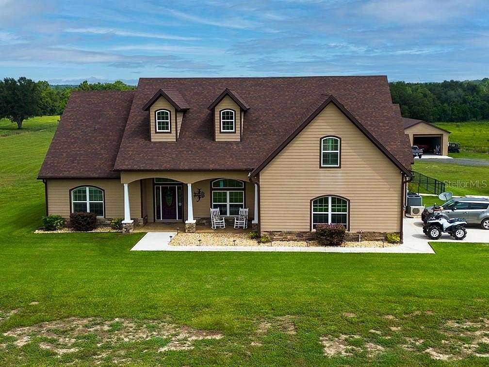 21.3 Acres of Agricultural Land with Home for Sale in Umatilla, Florida