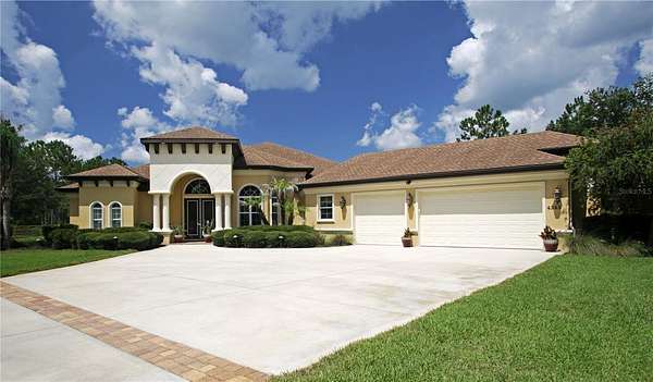 5 Acres of Land with Home for Sale in Palm Coast, Florida