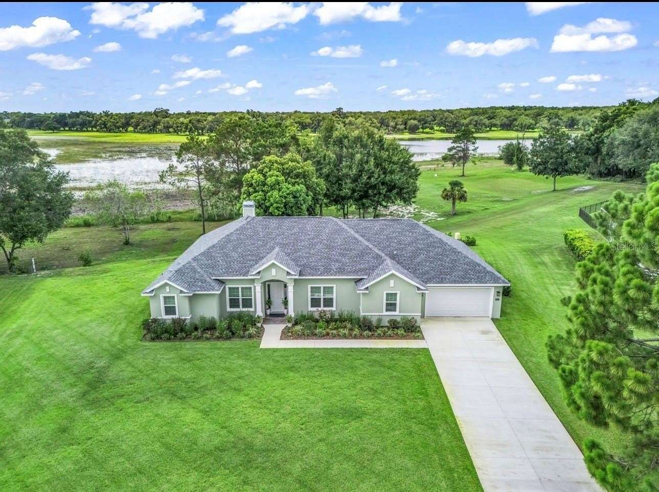 2 Acres of Land with Home for Sale in Lady Lake, Florida
