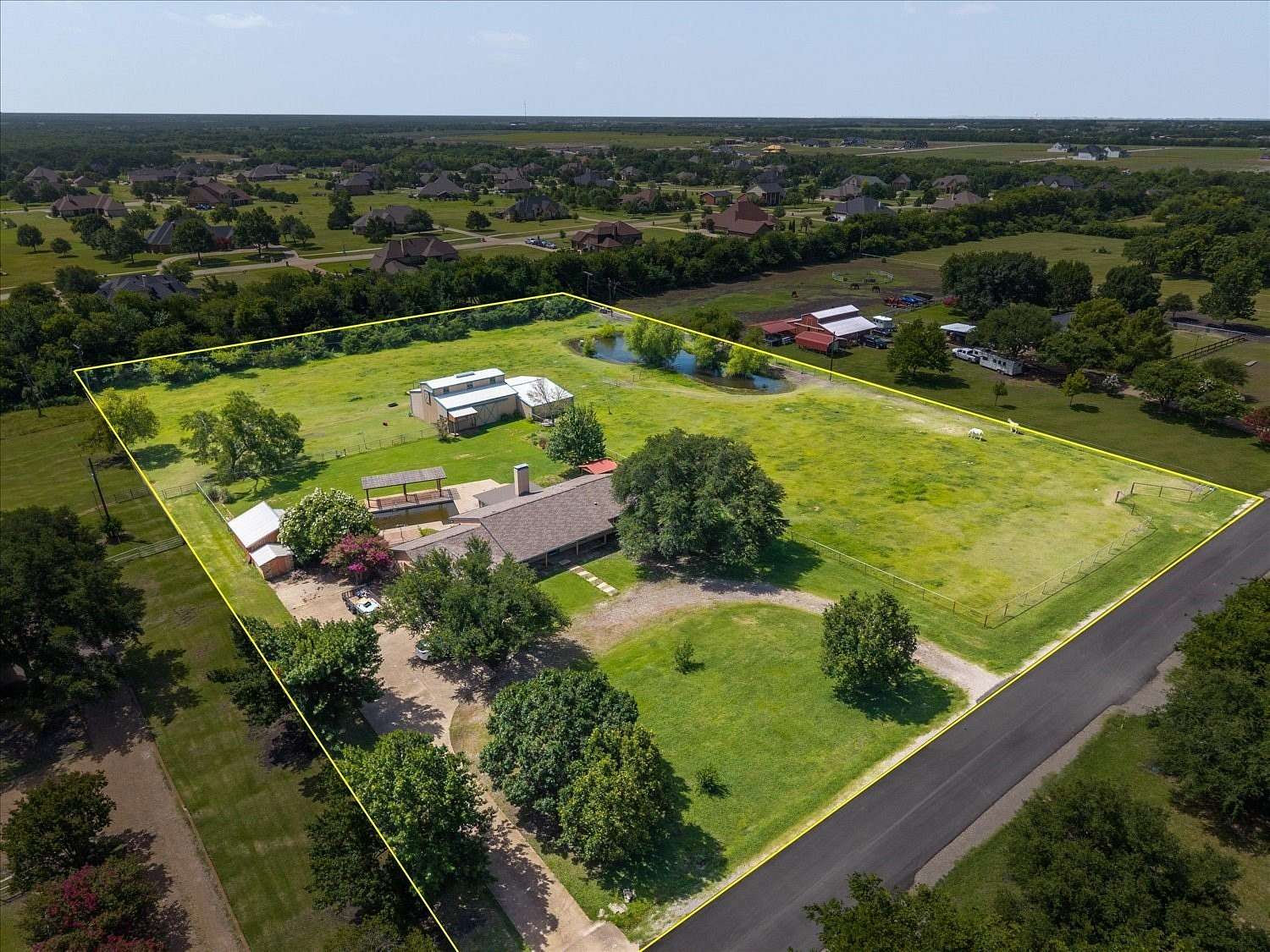 3.38 Acres of Land with Home for Sale in McLendon-Chisholm, Texas