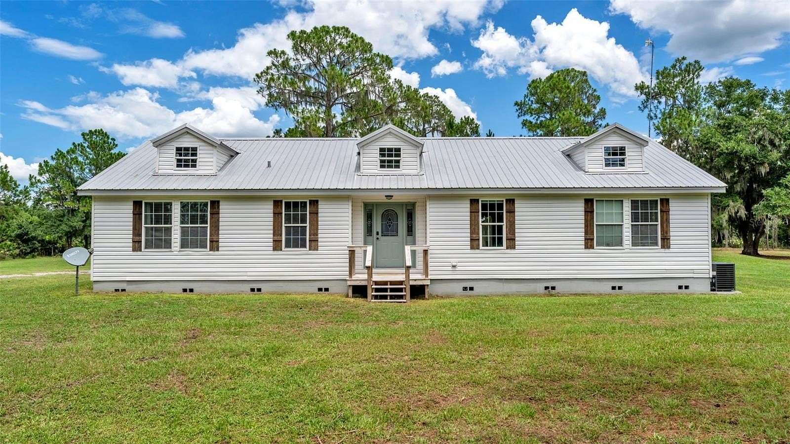 7.66 Acres of Land with Home for Sale in Bartow, Florida