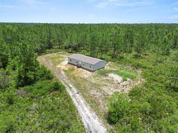 18.8 Acres of Land with Home for Sale in Clermont, Florida