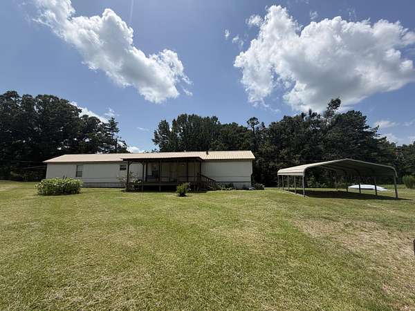 14 Acres of Land with Home for Sale in Hickory Flat, Mississippi