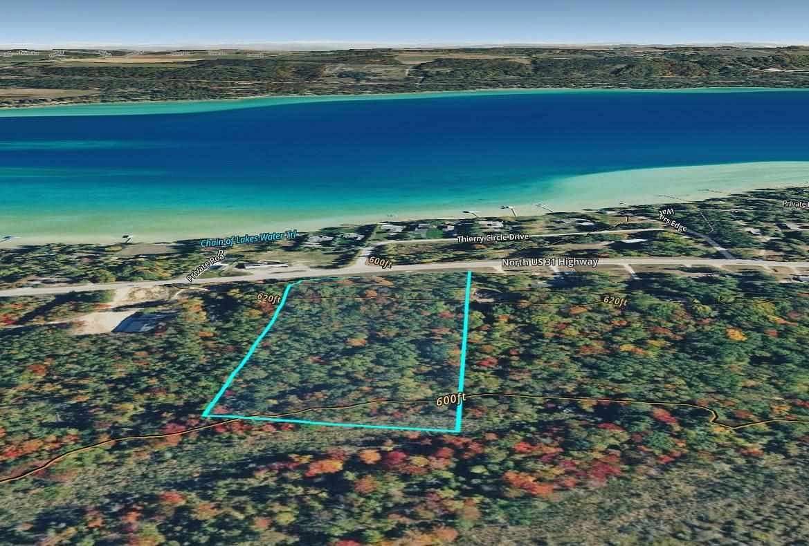 7 Acres of Residential Land for Sale in Kewadin, Michigan