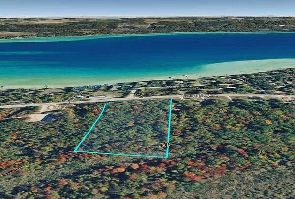 7 Acres of Residential Land for Sale in Kewadin, Michigan