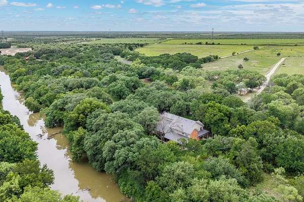 47 Acres of Agricultural Land with Home for Sale in Santa Anna, Texas