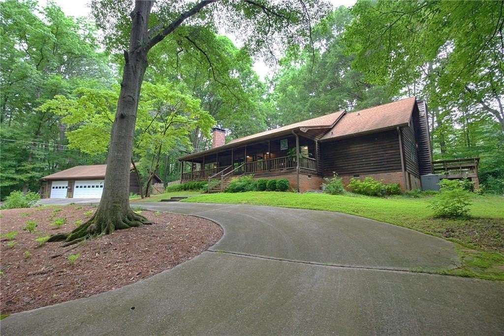 6.4 Acres of Land with Home for Sale in Mableton, Georgia