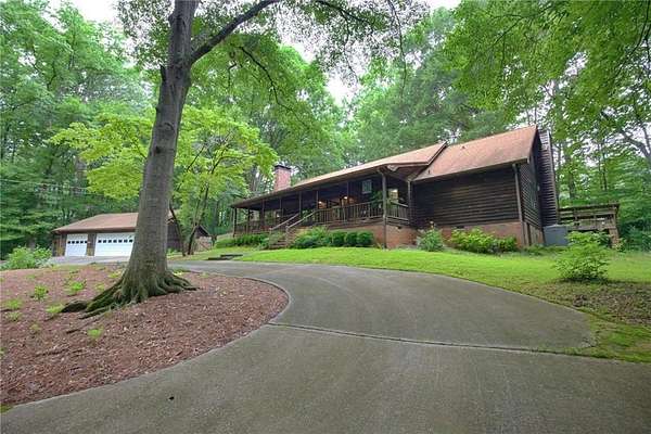 6.4 Acres of Land with Home for Sale in Mableton, Georgia