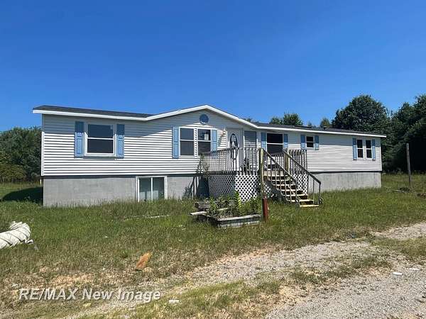 2 Acres of Land with Home for Sale in Chesaning, Michigan