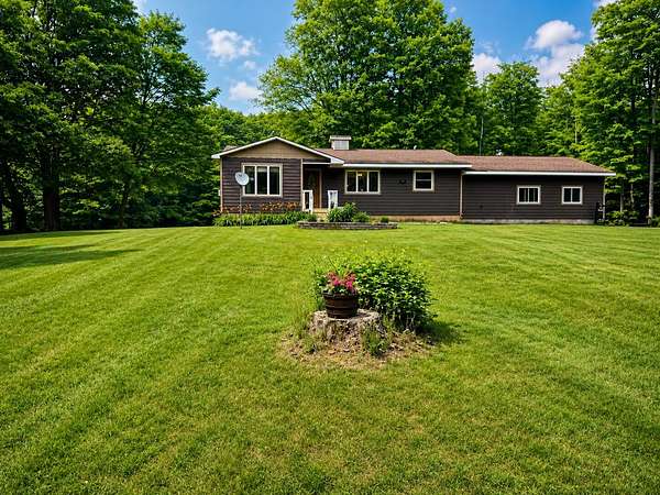 10.5 Acres of Land with Home for Sale in Newberry, Michigan