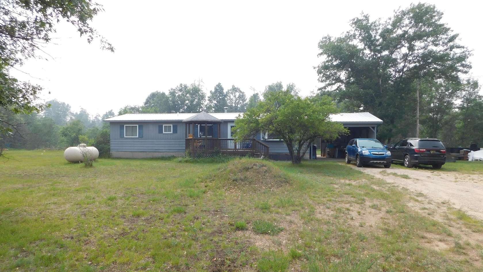 2.5 Acres of Land with Home for Sale in Grayling, Michigan