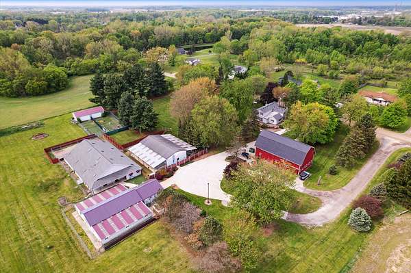 11.5 Acres of Land with Home for Sale in Fowlerville, Michigan