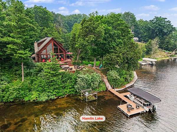 10.6 Acres of Land with Home for Sale in Free Soil, Michigan
