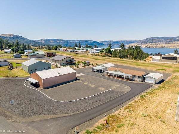 1.66 Acres of Land with Home for Sale in Seven Bays, Washington