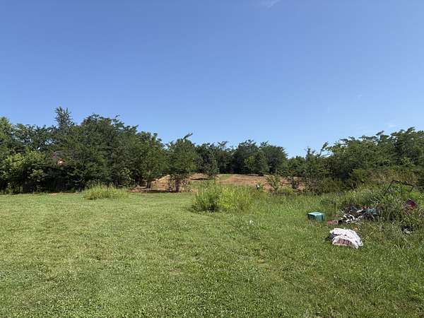 16.3 Acres of Land with Home for Sale in Portland, Tennessee