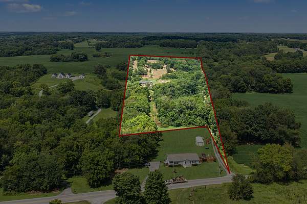 16.9 Acres of Land with Home for Sale in Portland, Tennessee