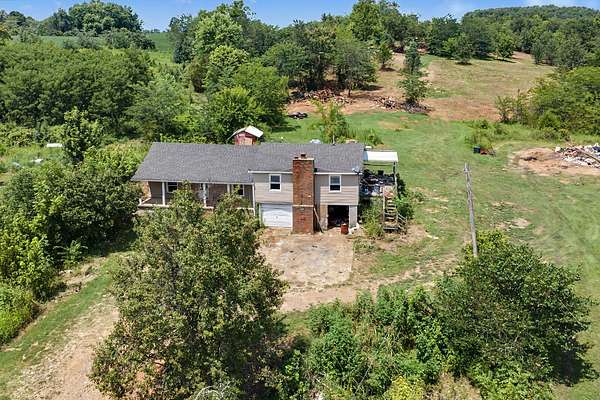 16.9 Acres of Land with Home for Sale in Portland, Tennessee
