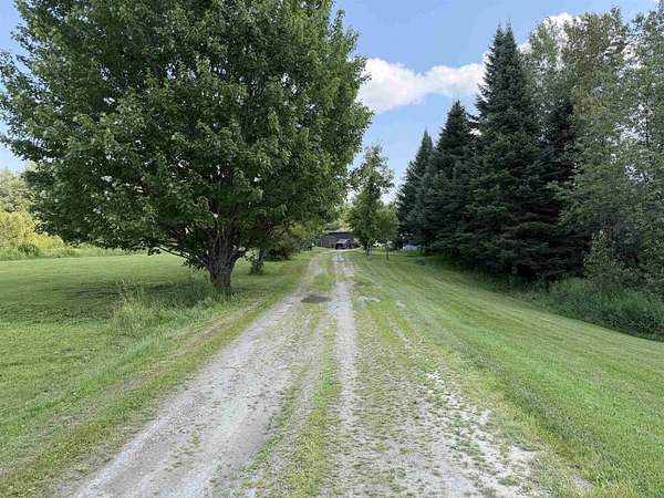 5.6 Acres of Land with Home for Sale in Holland, Vermont