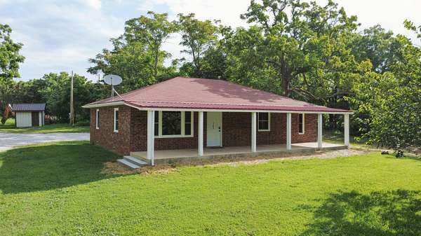 16.2 Acres of Land with Home for Sale in Everton, Missouri