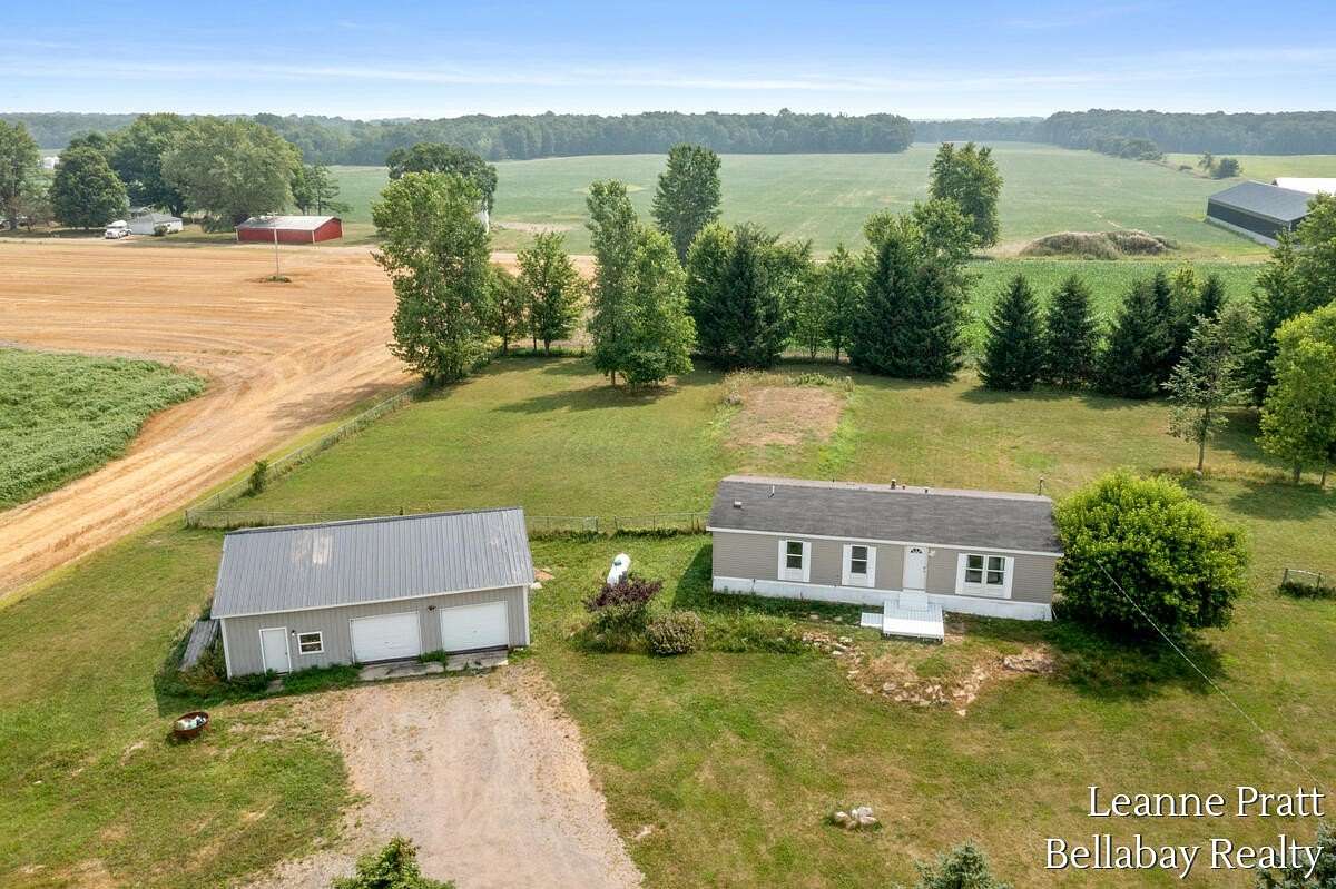 2.85 Acres of Land with Home for Sale in Lake Odessa, Michigan