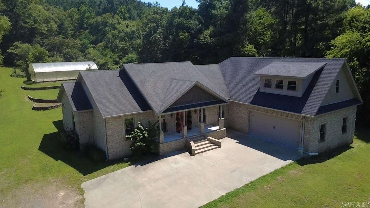 20.8 Acres of Land with Home for Sale in Danville, Arkansas