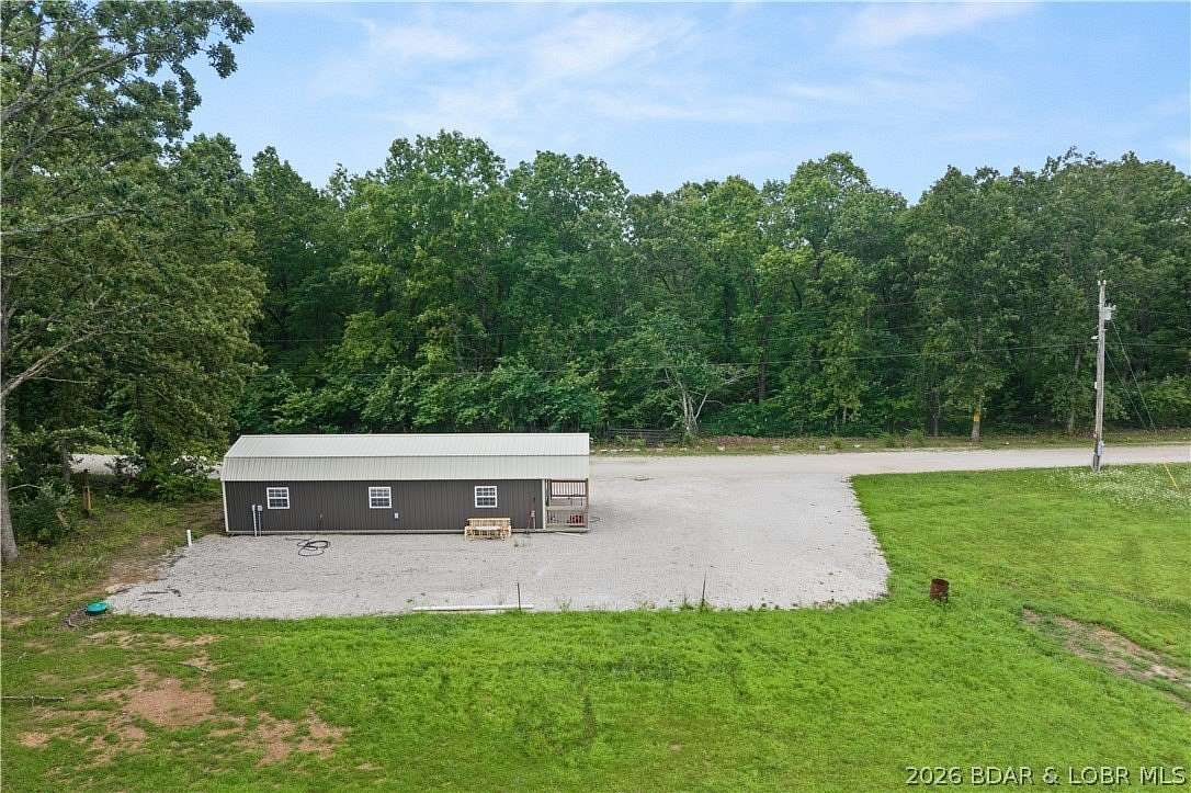 23 Acres of Land with Home for Sale in Gravois Mills, Missouri