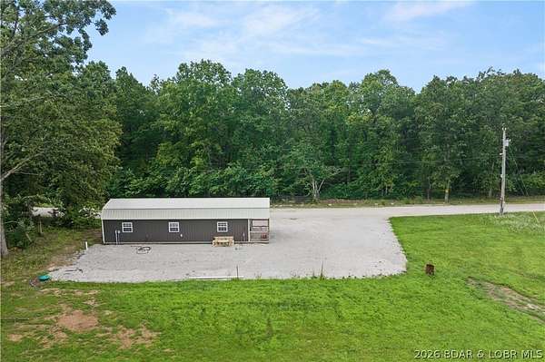 23 Acres of Land with Home for Sale in Gravois Mills, Missouri