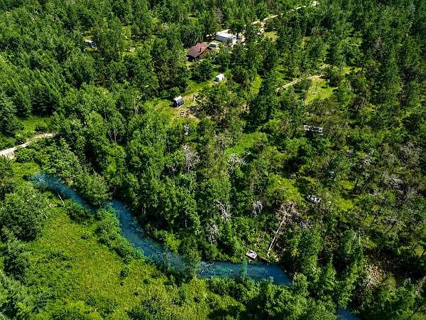 4 Acres of Land with Home for Sale in Lewiston, Michigan