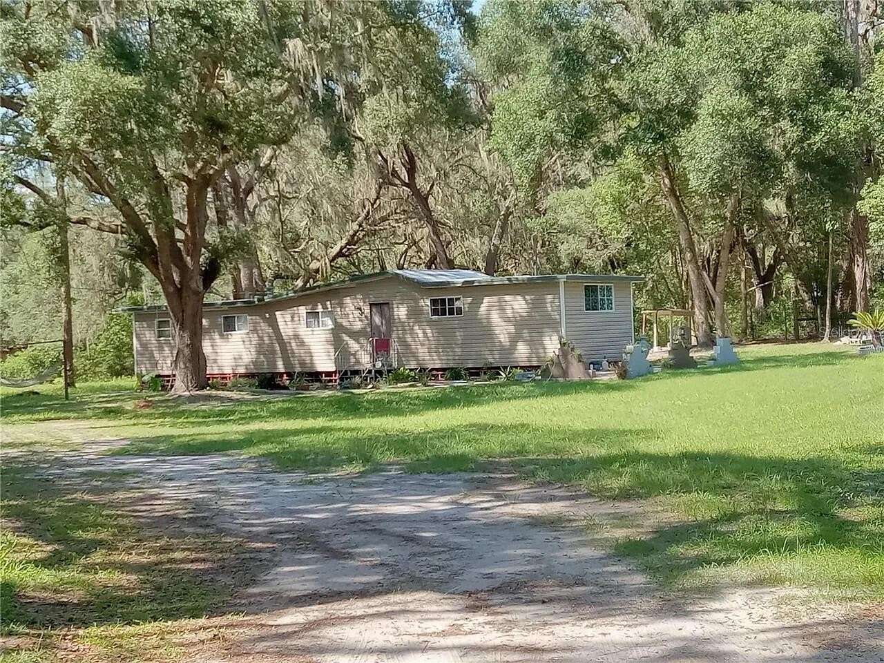 2 Acres of Land with Home for Sale in Weirsdale, Florida