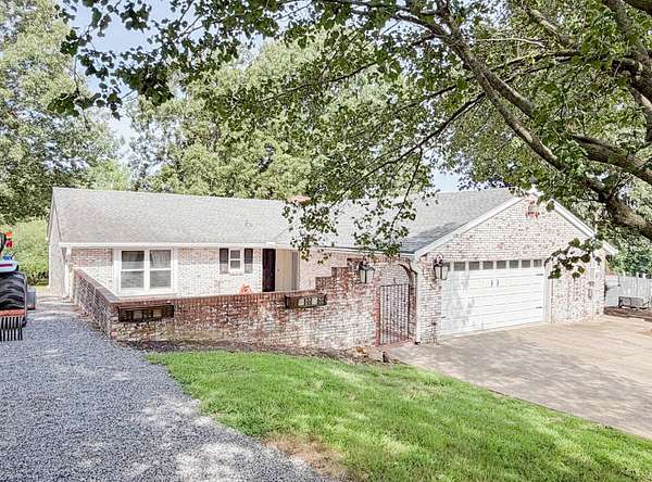 1.5 Acres of Land with Home for Sale in Gilbertsville, Kentucky