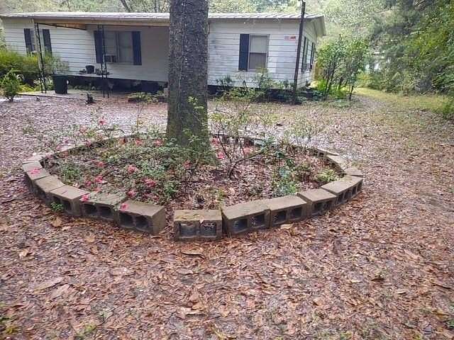21.1 Acres of Recreational Land with Home for Sale in Irvington, Alabama