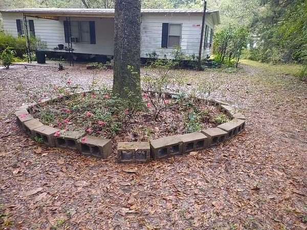 21.1 Acres of Recreational Land with Home for Sale in Irvington, Alabama