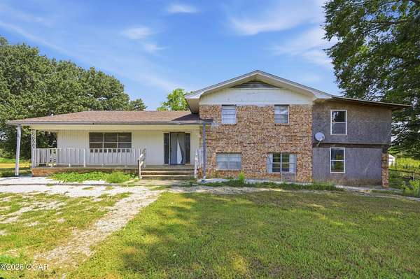 126 Acres of Recreational Land with Home for Sale in Granby, Missouri