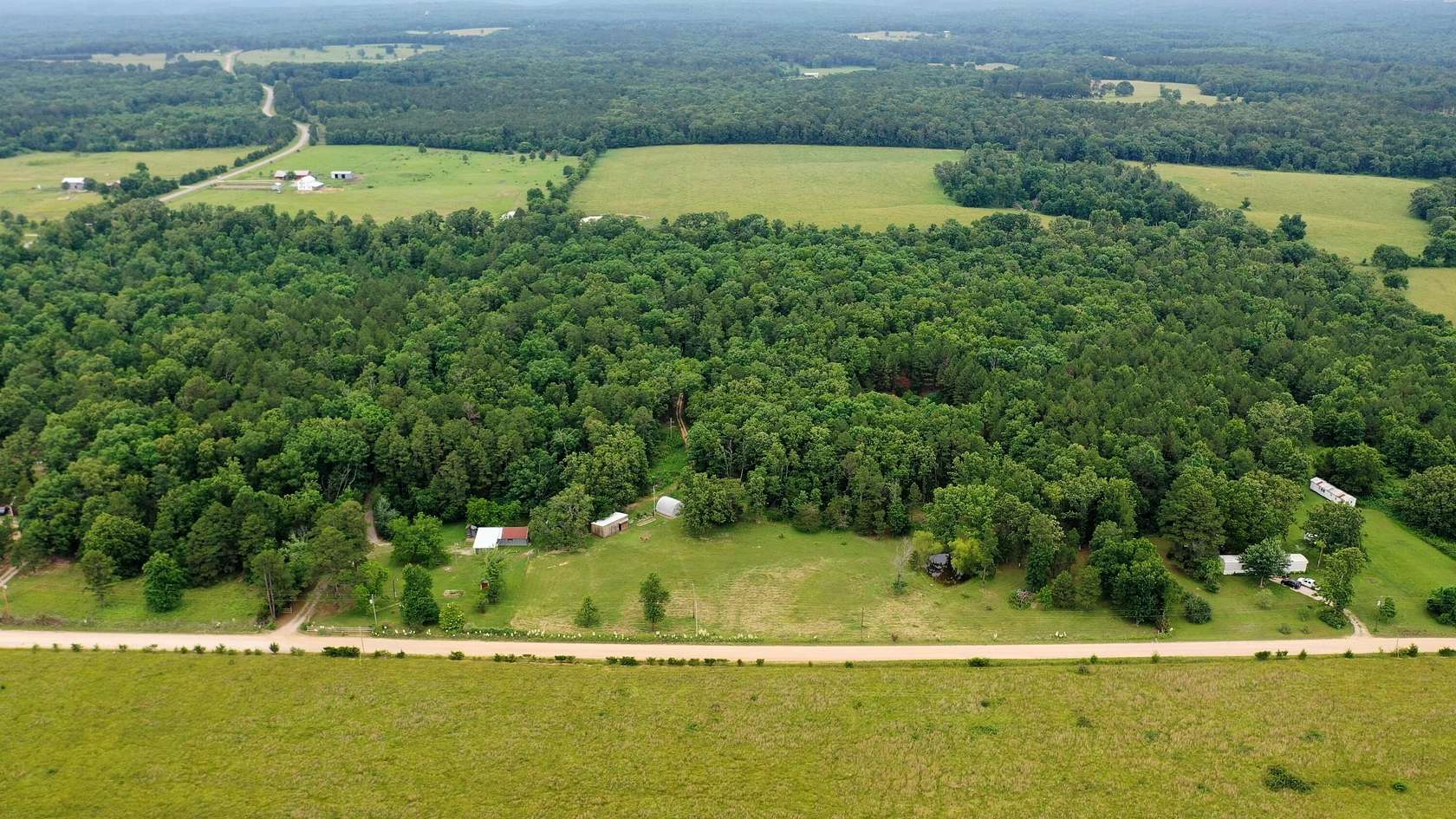 21 Acres of Land with Home for Sale in Hartshorn, Missouri