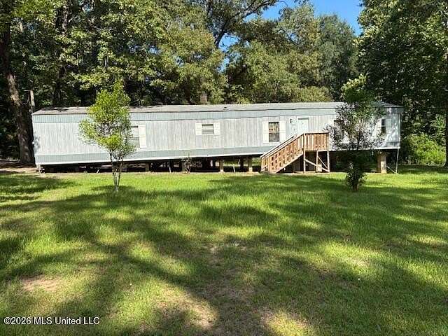 8.18 Acres of Land with Home for Sale in McComb, Mississippi