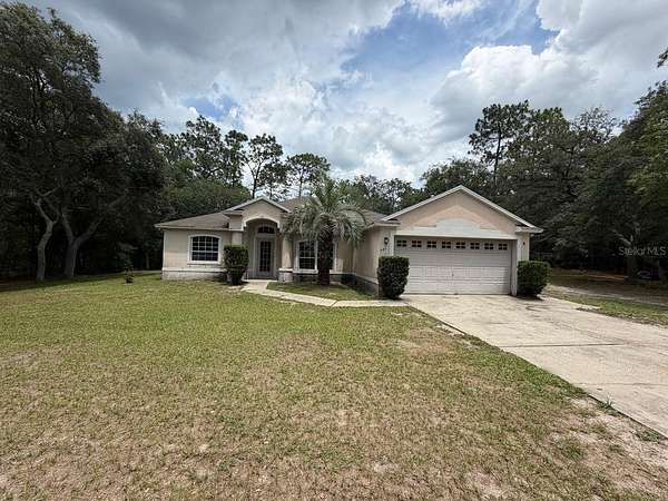 2.5 Acres of Land with Home for Sale in Lake Helen, Florida