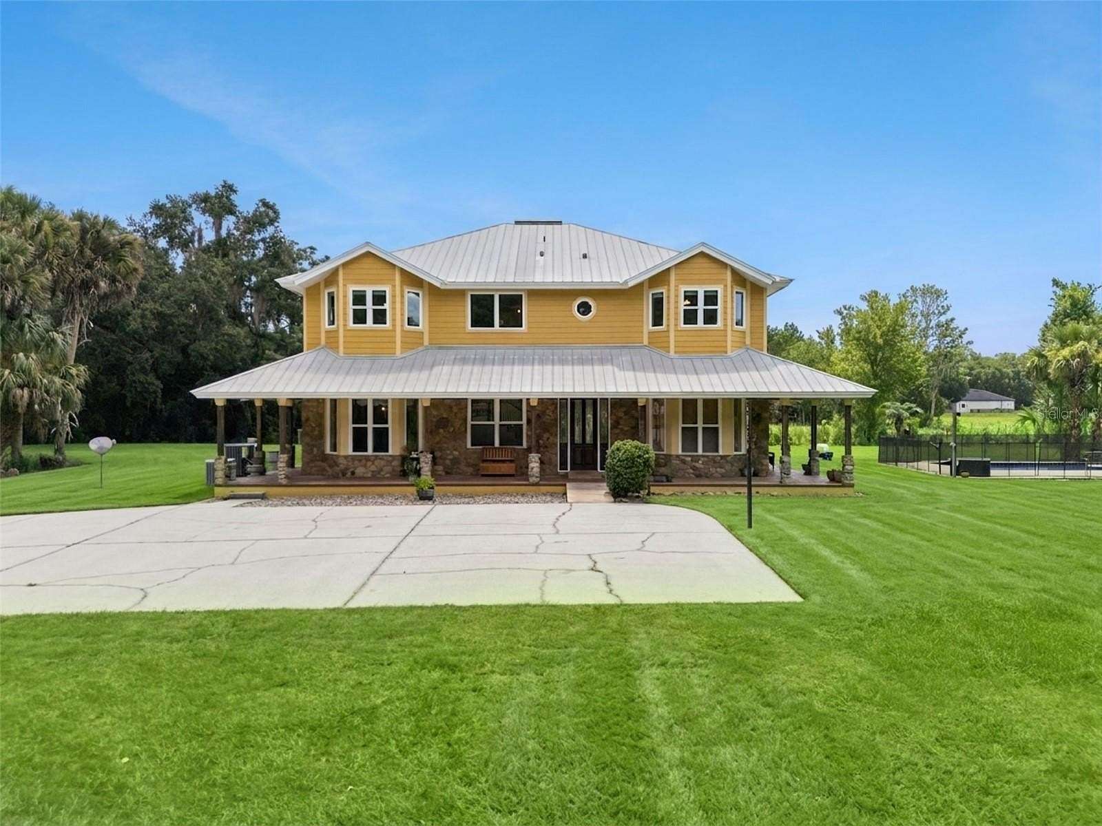 5.12 Acres of Land with Home for Sale in Oviedo, Florida