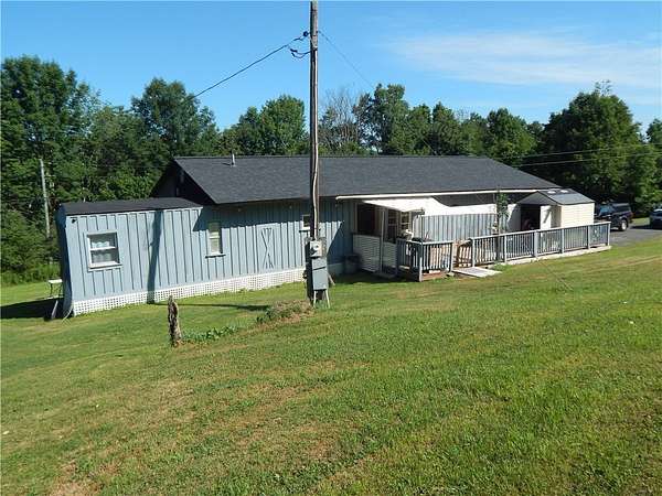 1.64 Acres of Land with Home for Sale in Morris, New York