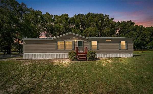 1.59 Acres of Land with Home for Sale in Anthony, Florida