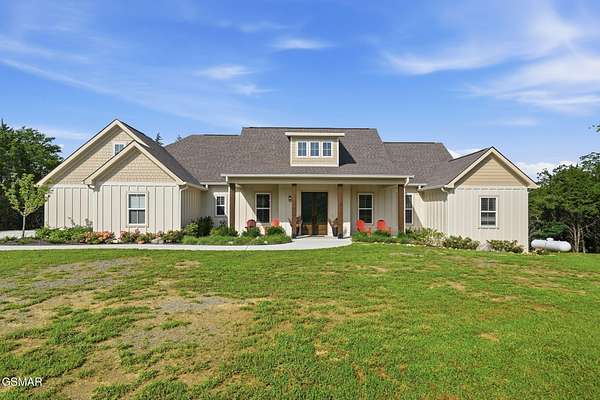 10.7 Acres of Land with Home for Sale in Sevierville, Tennessee