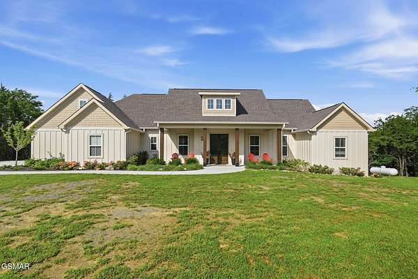 10.7 Acres of Land with Home for Sale in Sevierville, Tennessee