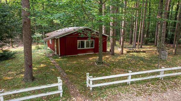 34.2 Acres of Recreational Land with Home for Sale in Pentwater, Michigan