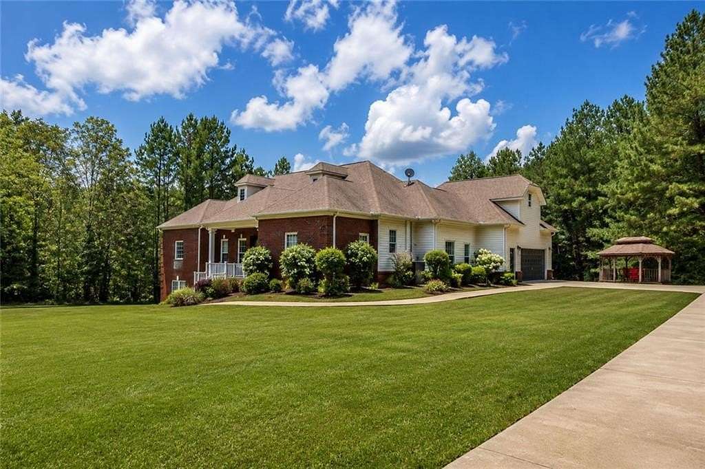 23 Acres of Recreational Land with Home for Sale in Commerce, Georgia