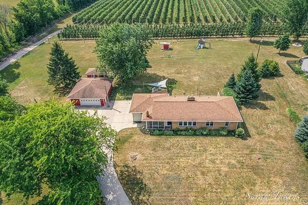 2.25 Acres of Land with Home for Sale in Sparta, Michigan