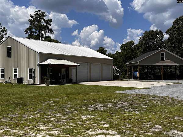 6.29 Acres of Land with Home for Sale in Elgin, South Carolina