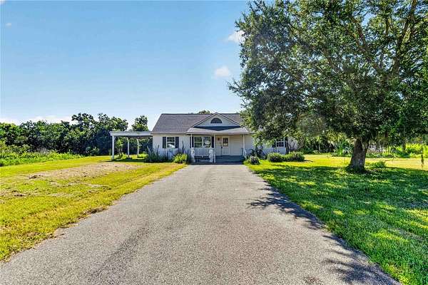 2.62 Acres of Land with Home for Sale in Kissimmee, Florida