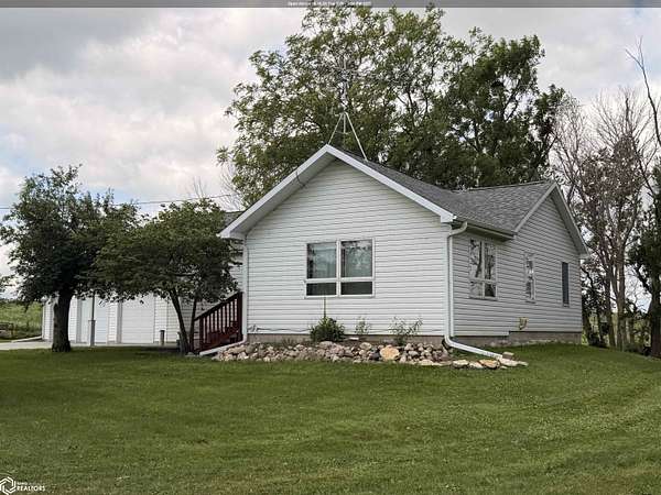 9.6 Acres of Land with Home for Auction in Thornton, Iowa